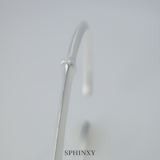 SEGMENTED BAMBOO-CIRCLED CUFF