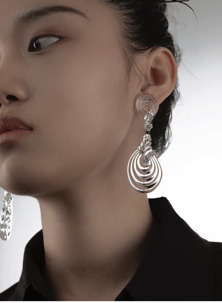 DOUBLE-KNOTTED SWASTIKA RESIN EARRINGS