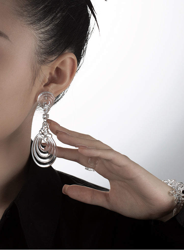 DOUBLE-KNOTTED SWASTIKA RESIN EARRINGS