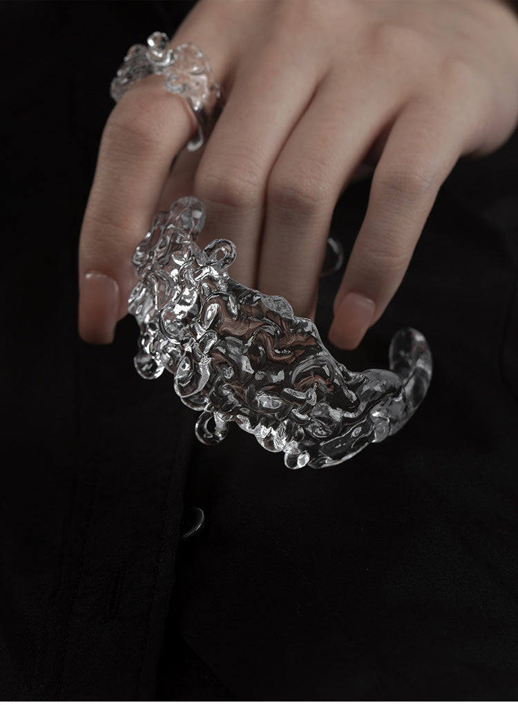 CARVED RESIN SWASTIKA-KNOT BANGLE