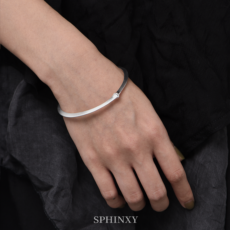 SEGMENTED BAMBOO-CIRCLED CUFF