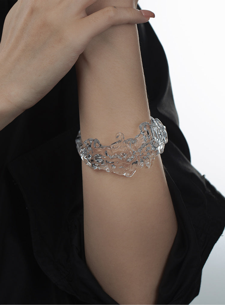 CARVED RESIN SWASTIKA-KNOT BANGLE