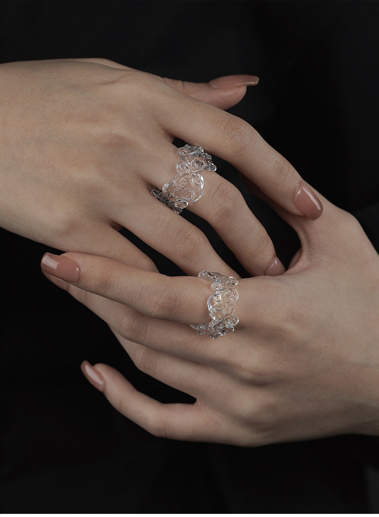 CARVED RESIN SWASTIKA-KNOT RING