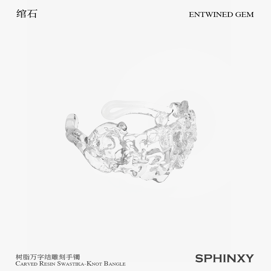CARVED RESIN SWASTIKA-KNOT BANGLE
