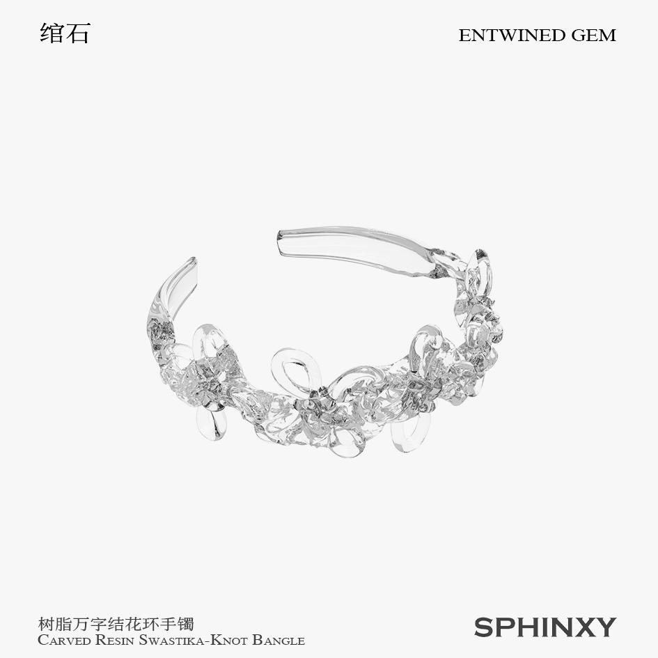 CARVED RESIN SWASTIKA-KNOT BANGLE