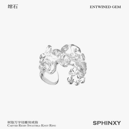 CARVED RESIN SWASTIKA-KNOT RING